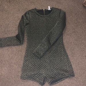 Fun shimmery long sleeved onesie ✨